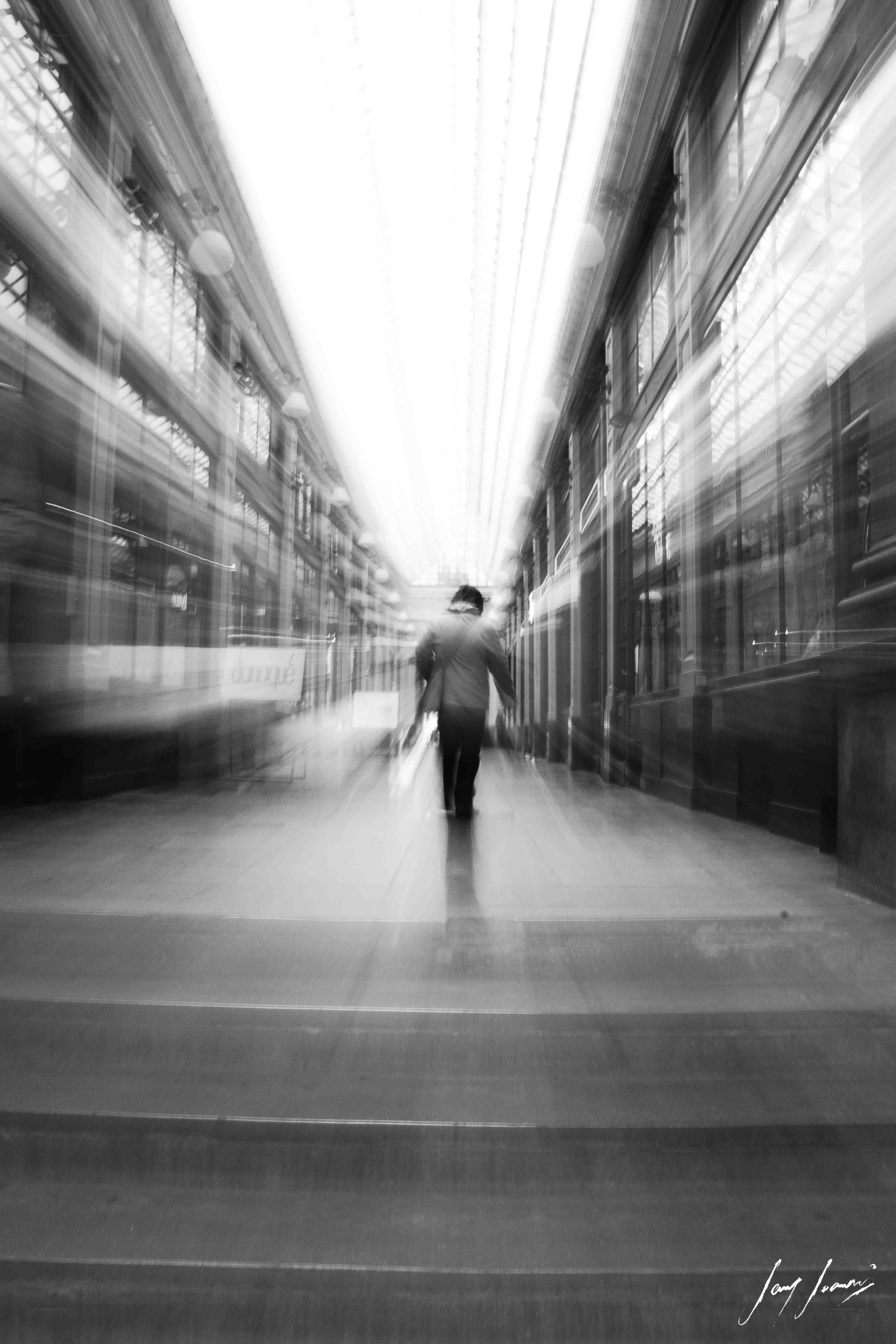 Person walking in a motion blur corridor