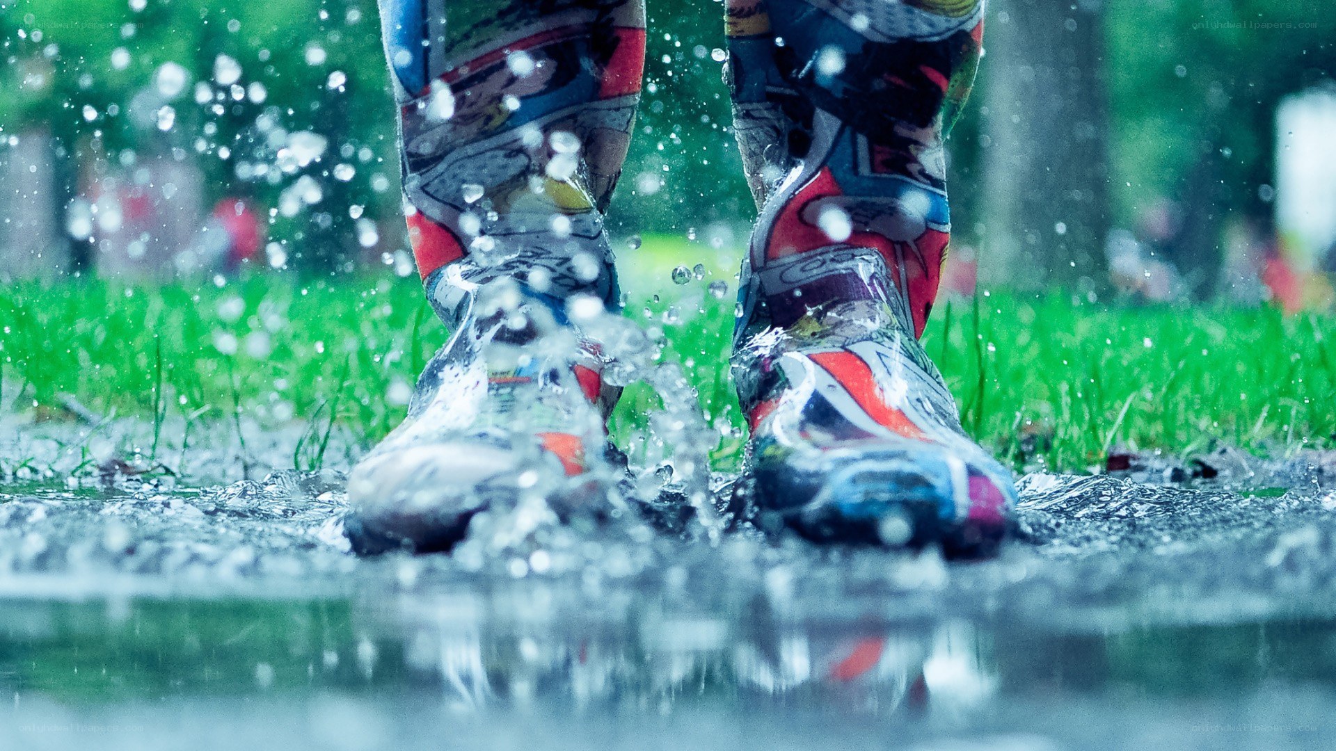 person walking in a puddle