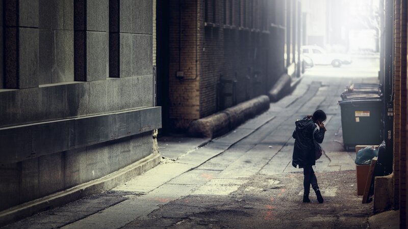 Person Walking in Alley — Gray