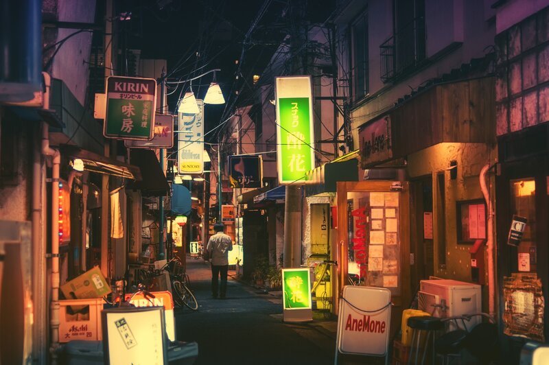 Person Walking in Alley — Green