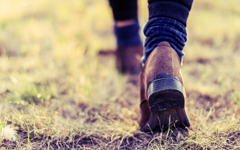 person walking in boots