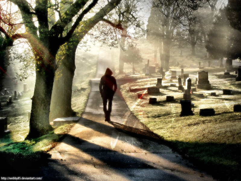 Person Walking in Cemetery — Green