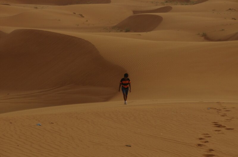 Person walking in desert