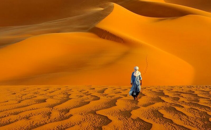 Person Walking in Desert — Orange, Dramatic