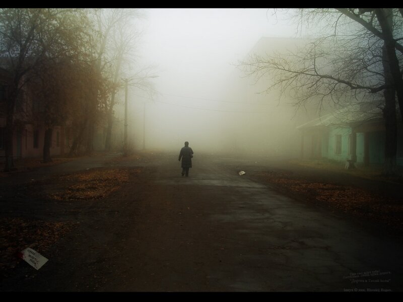 Person Walking in Fog — Gray