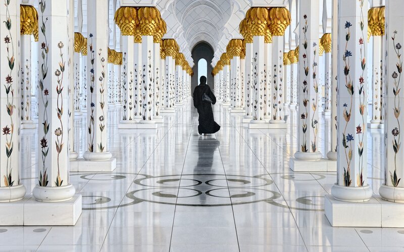 Person Walking in Hall