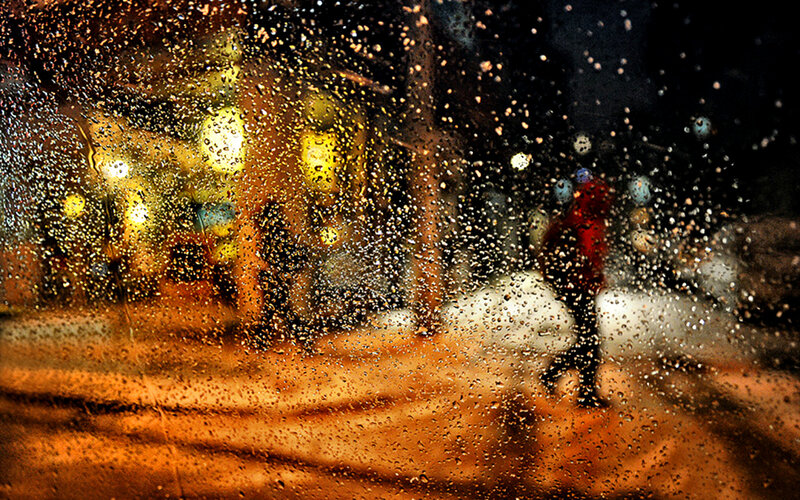Person Walking in Rain — Yellow