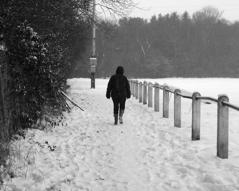Person Walking in Snow — Black, Solitary