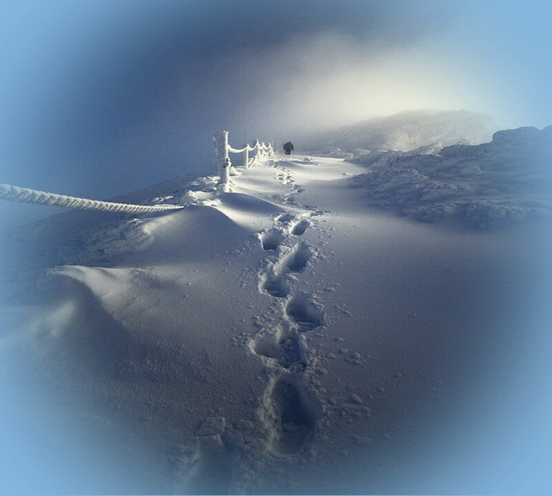 Person Walking in Snow — Blue