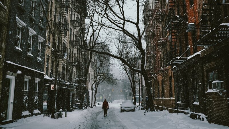Person Walking in Snow — White, Cold, Winter, Photograph, Buildings