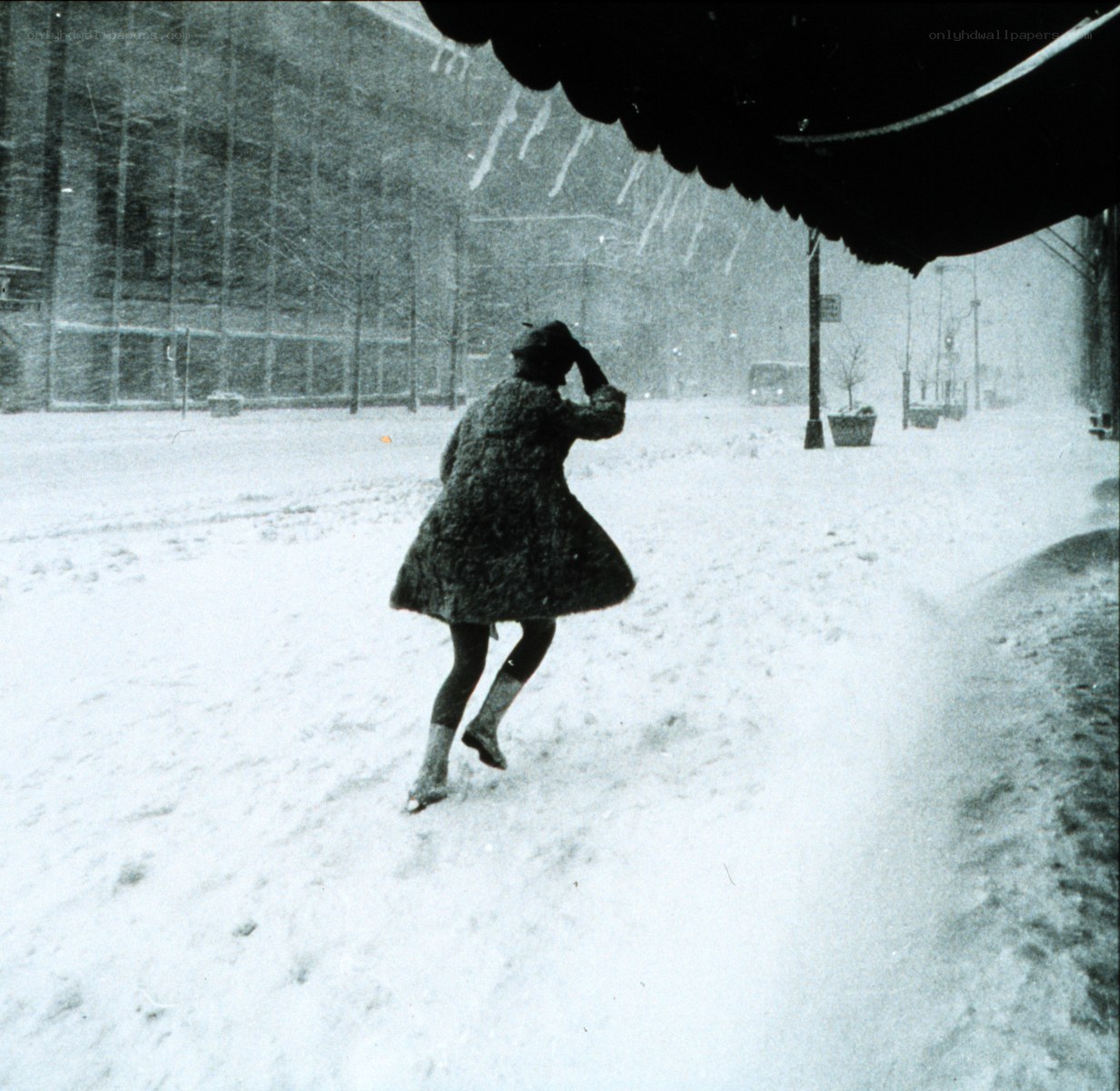 Person walking in snowstorm