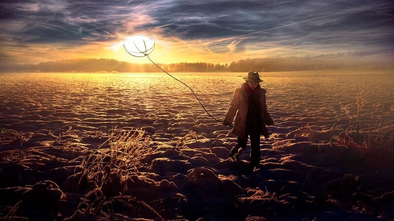 Person walking in snowy field