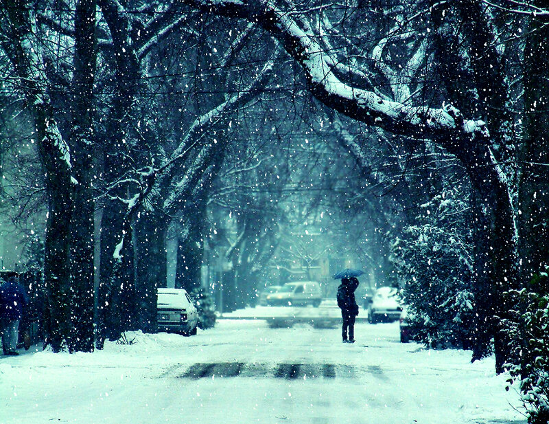 Person walking in snowy street