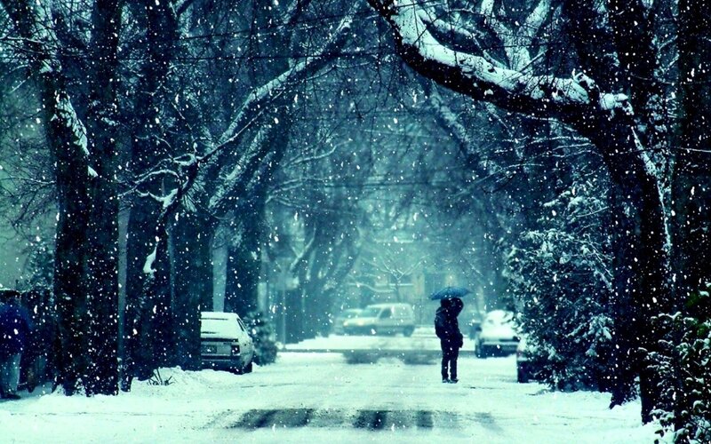 Person walking in snowy street