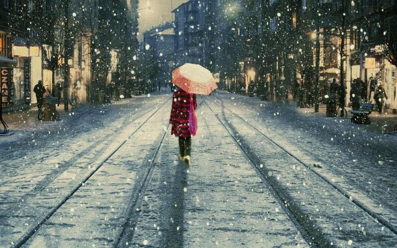 Person walking in snowy street