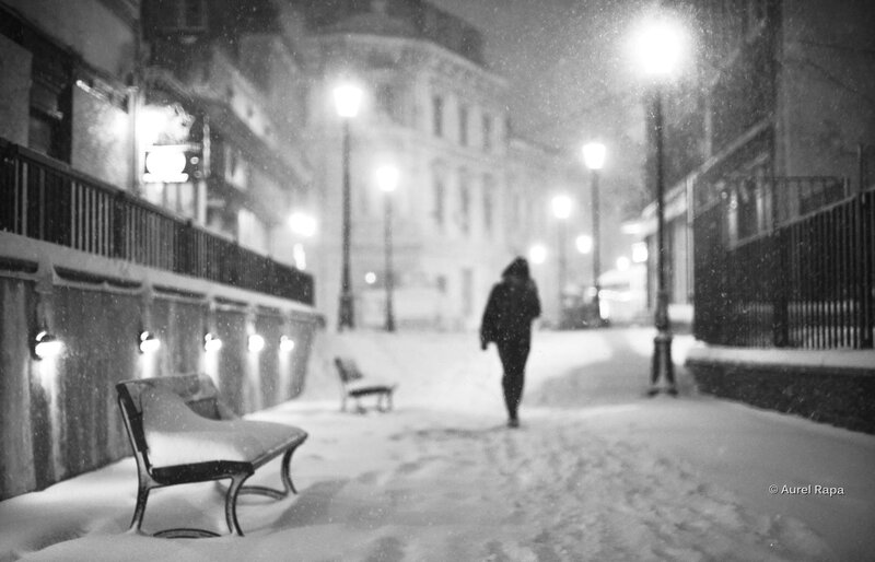 Person walking in snowy street