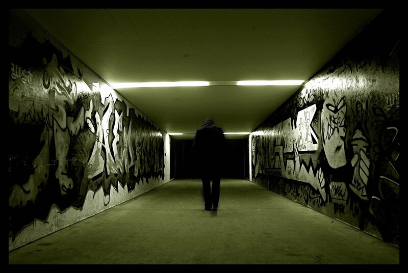 Person Walking in Tunnel — Green, Dramatic, Night