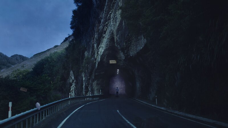 Person Walking into Tunnel