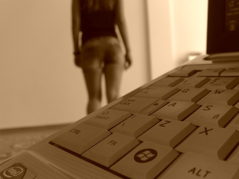 person walking near keyboard