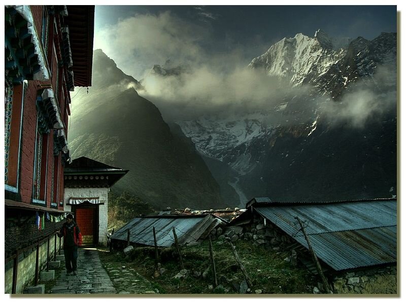 Person Walking Near Monastery