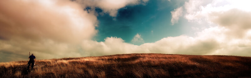 Person walking on a hill