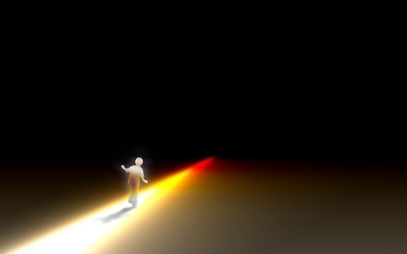 person walking on a light path