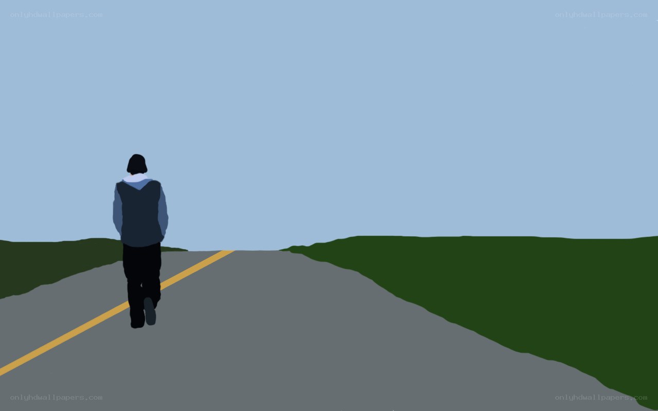 person walking on a road