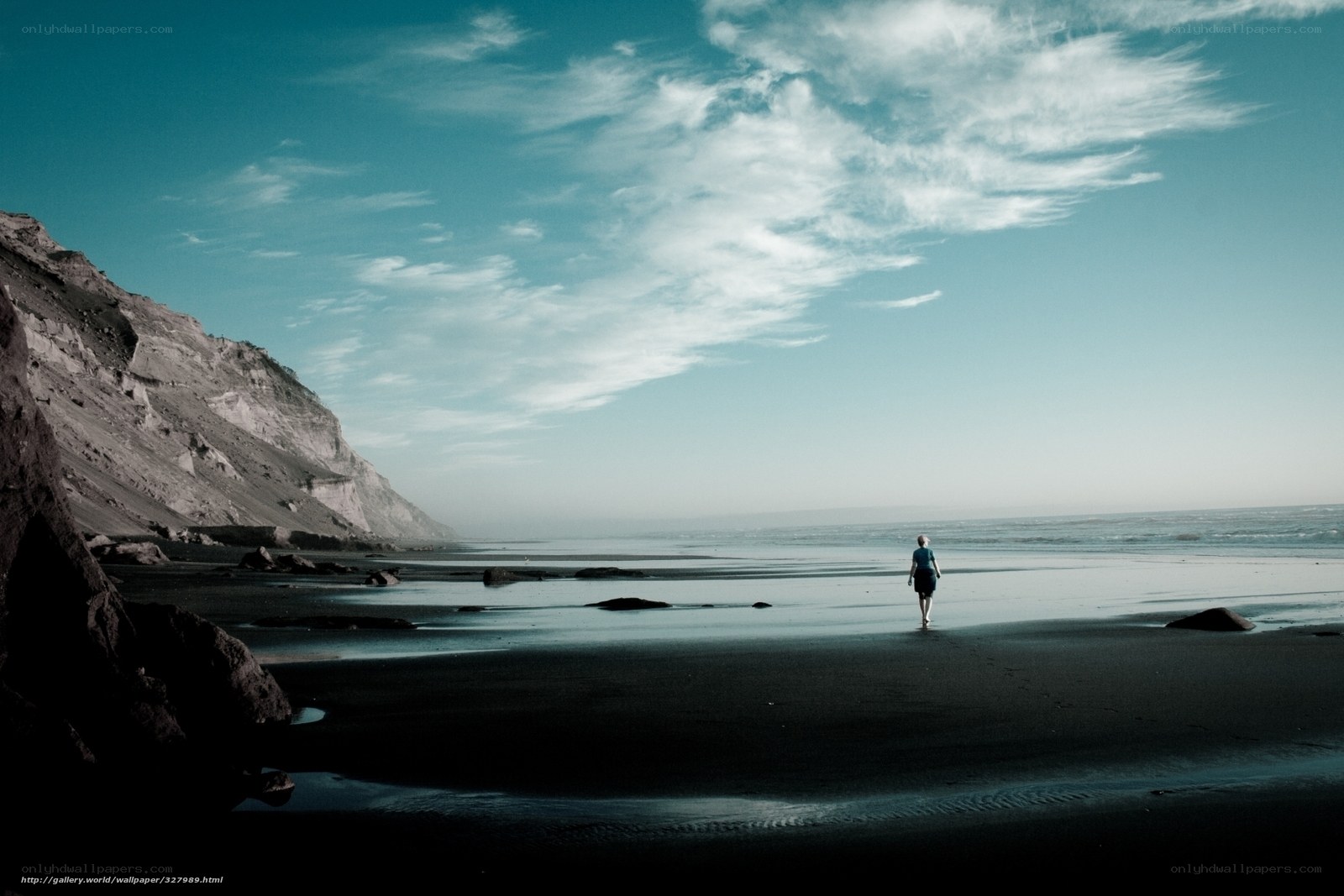 Person walking on beach