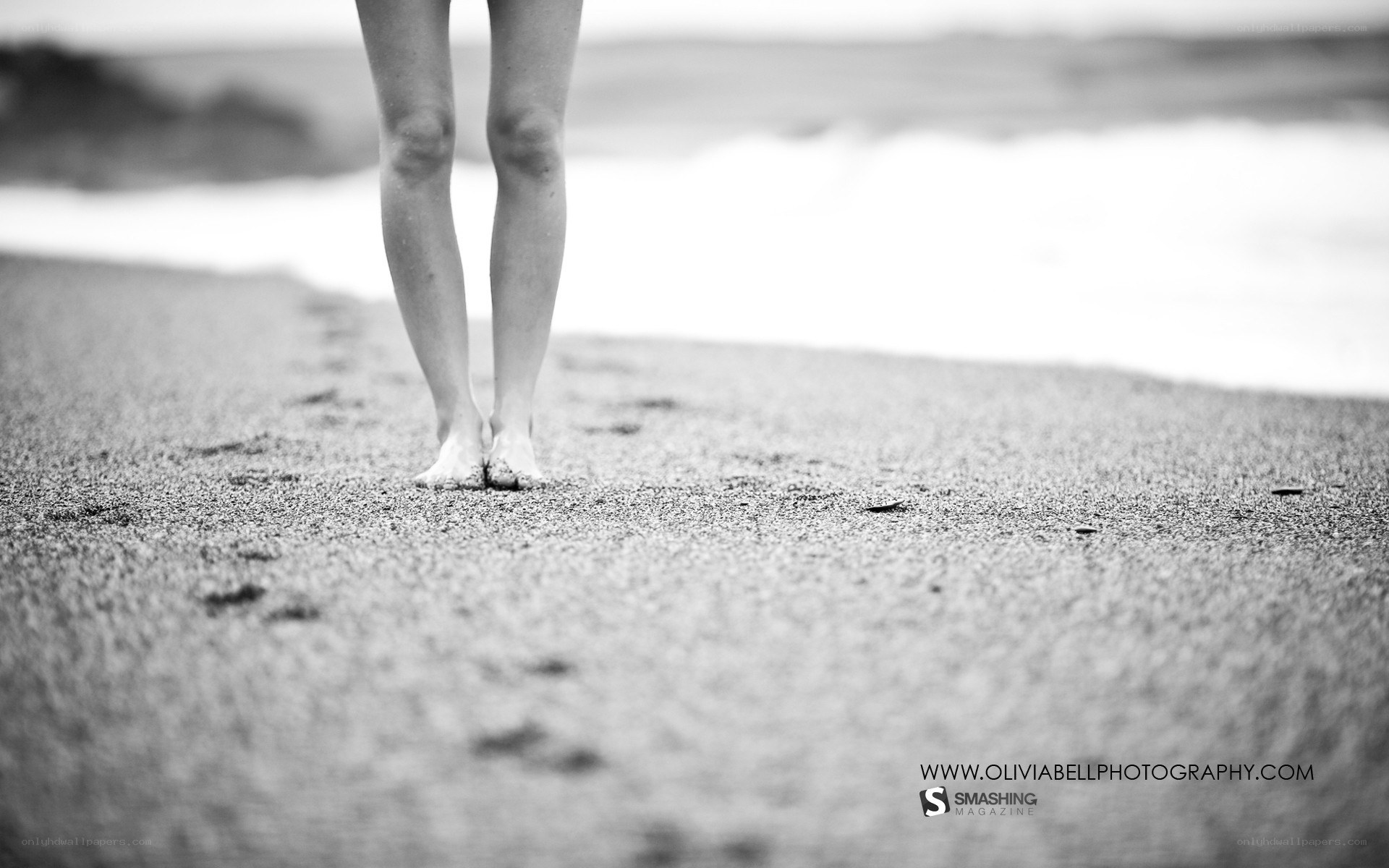person walking on beach