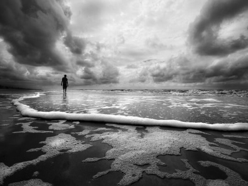 Person Walking on Beach — Black