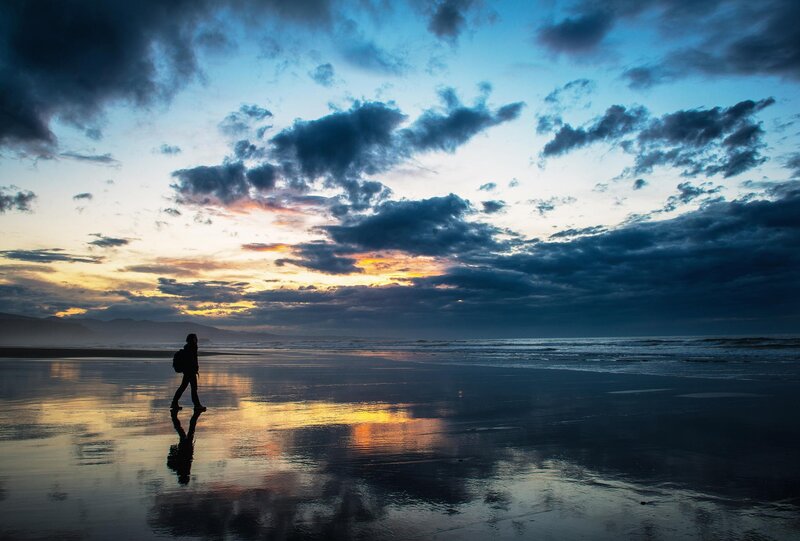 Person Walking on Beach — Blue, Dramatic