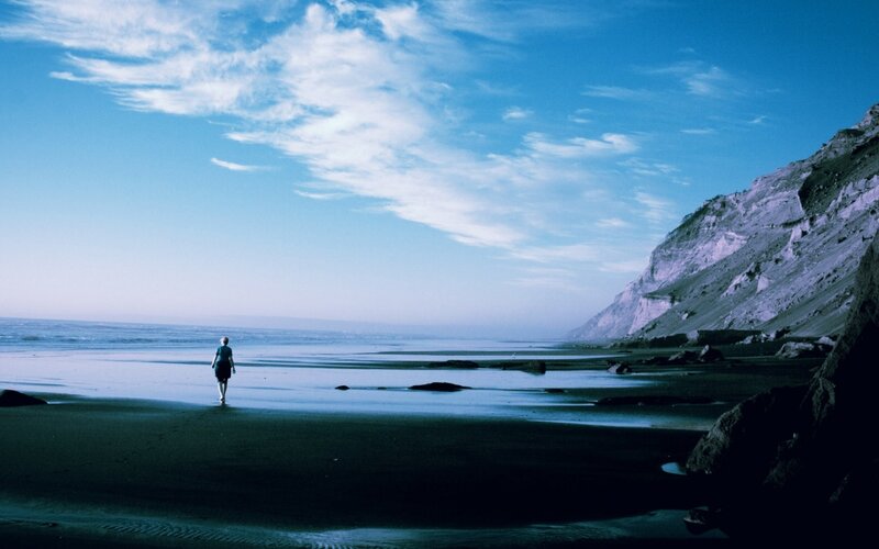 Person Walking on Beach — Blue, Serene, Afternoon, Photograph, Ocean