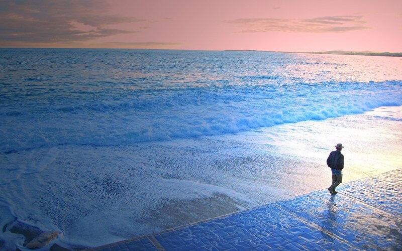 Person Walking on Beach — Blue, Serene, Sunset, Photograph