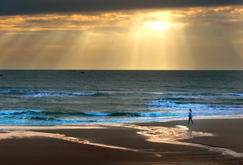 Person Walking on Beach — Gold