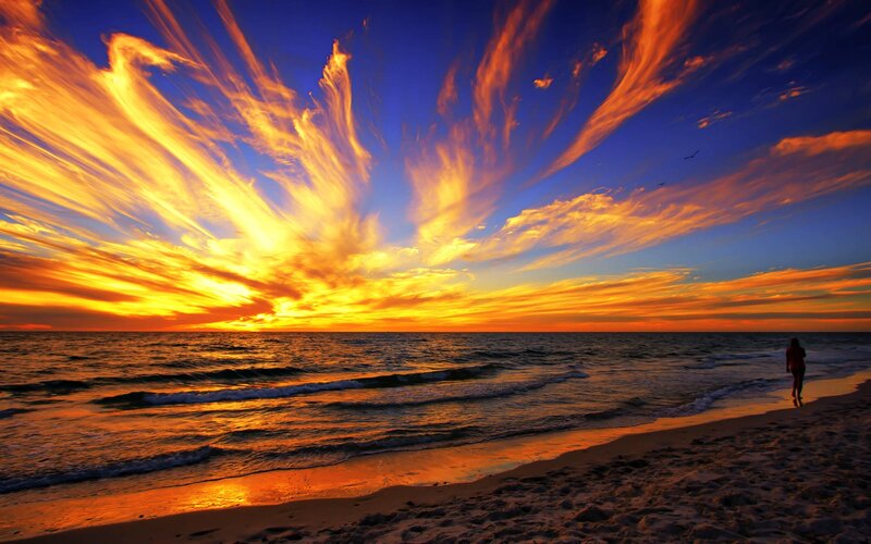 Person Walking on Beach — Orange, Dramatic