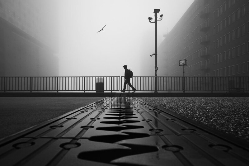 Person Walking on Bridge — Black, Somber