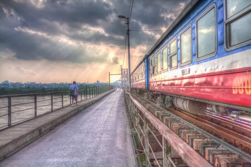 Person Walking on Bridge — Blue, Dramatic