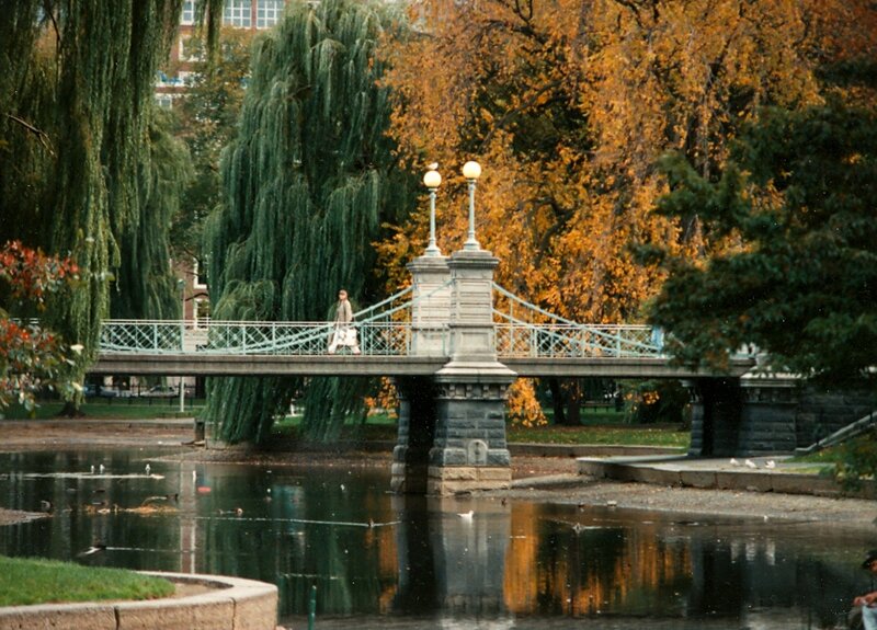 Person Walking on Bridge
