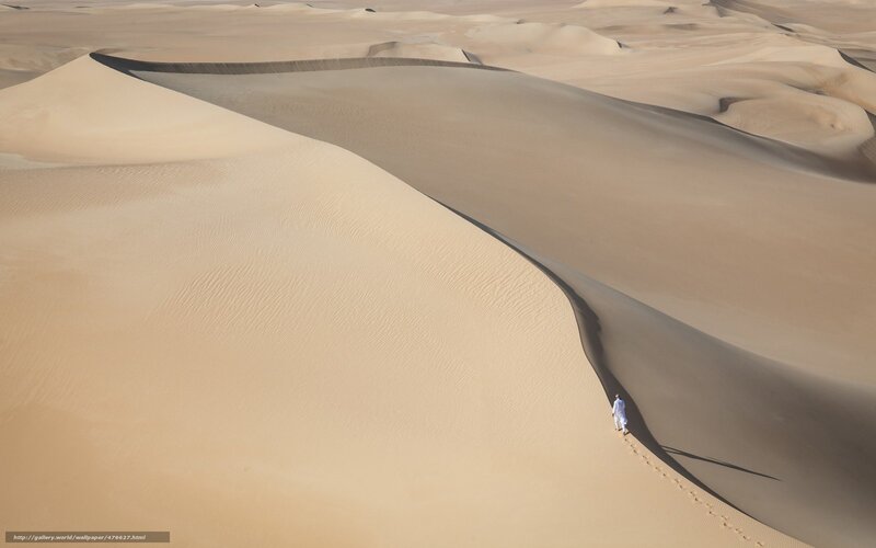 Person Walking on Dune — Beige