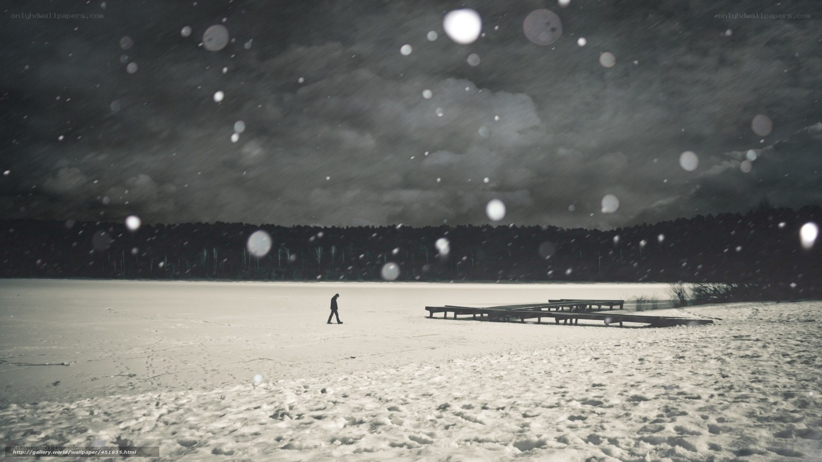Person walking on frozen lake