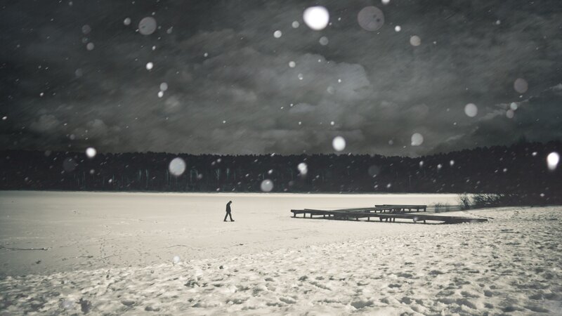 Person Walking on Ice — White