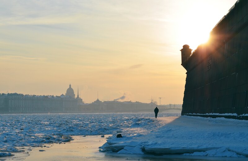 Person Walking on Ice — Yellow