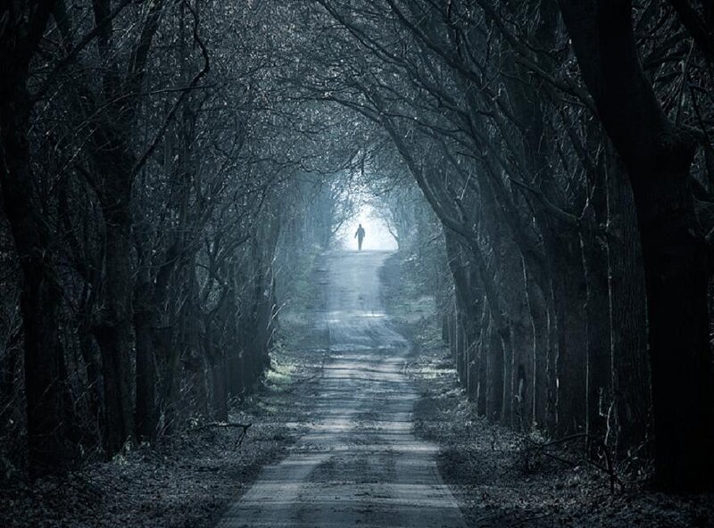Person Walking on Path — Blue