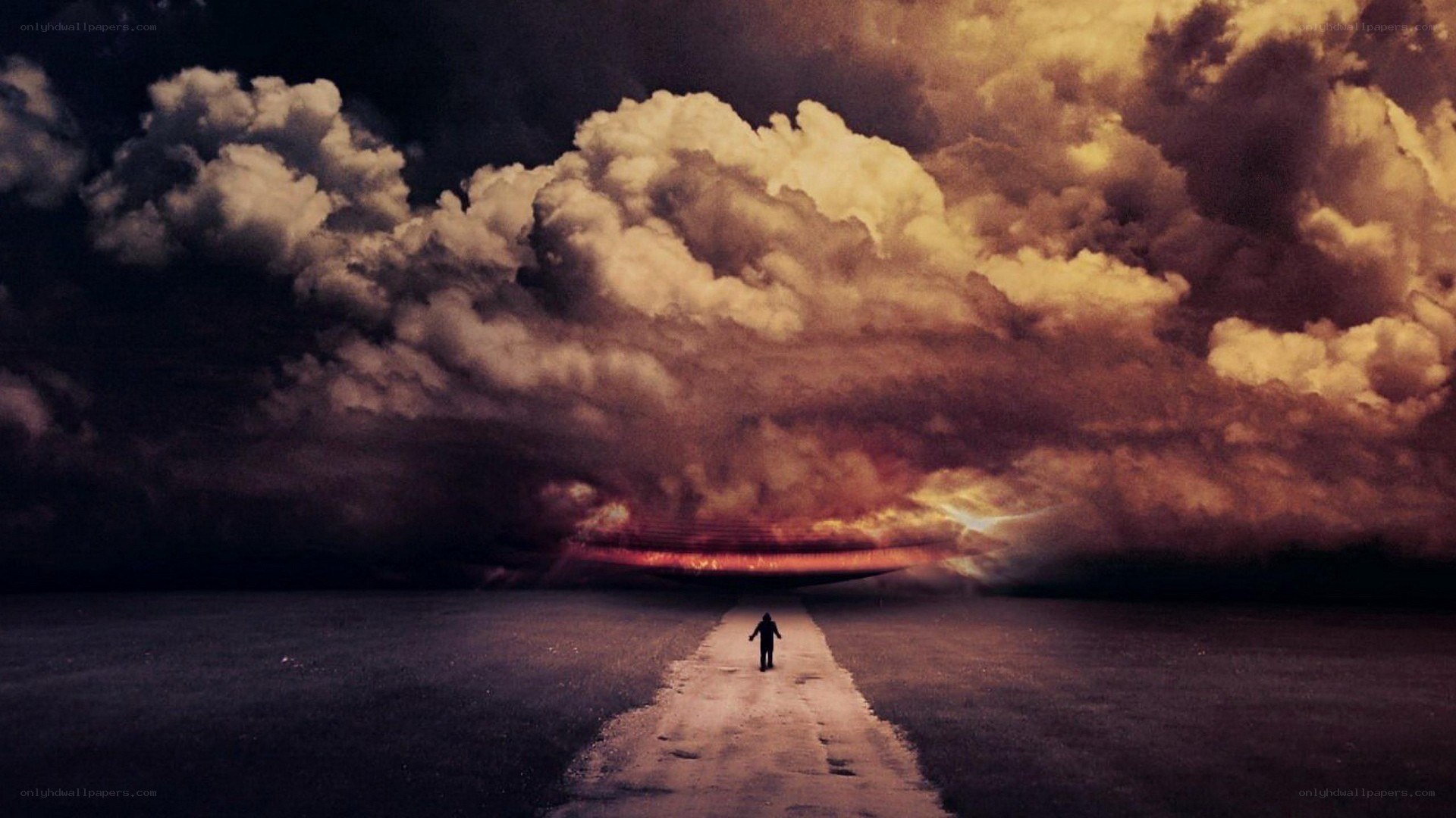 Person walking on path to storm