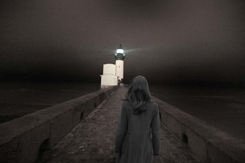 Person Walking on Pier — Black