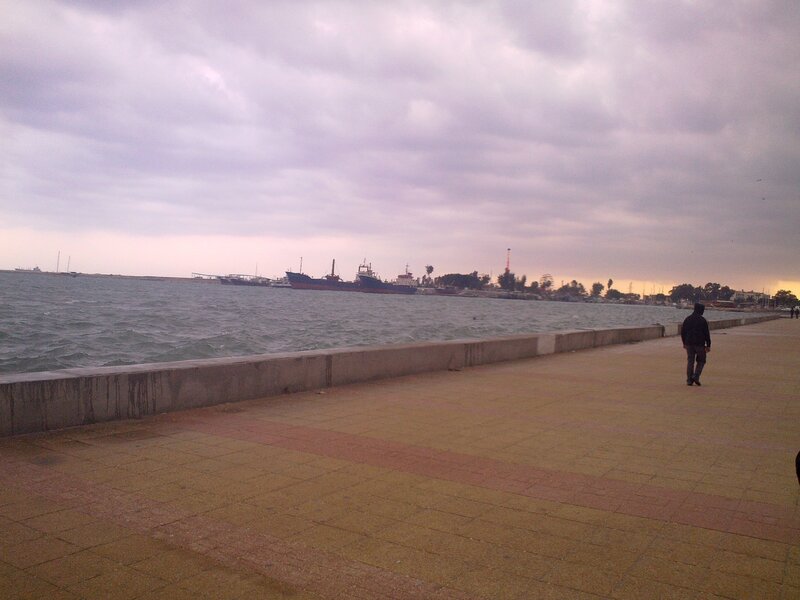 person walking on pier