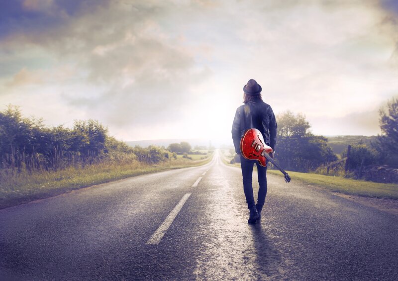 Person Walking on Road — Gray, Dramatic