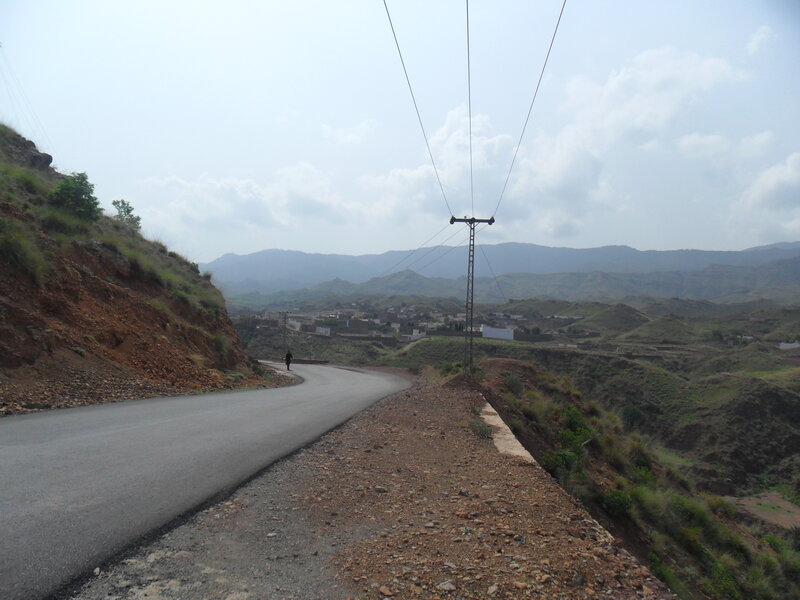 Person Walking on Road — Gray