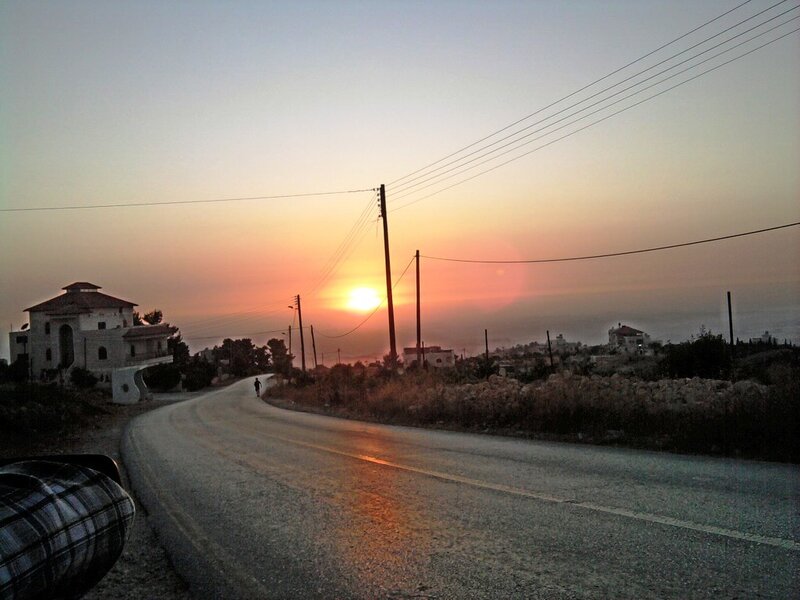Person Walking on Road — Orange