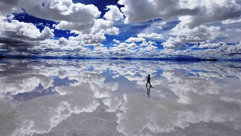 Person Walking on Salt Flat — Blue, Dramatic, Afternoon